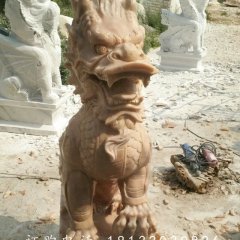 踩球麒麟雕塑，晚霞紅麒麟石雕